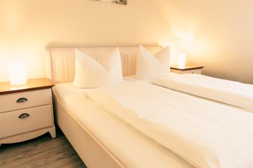 Spiekeroog Ferienwohnung Haus Seeschwalbe In d&#39; Dörp - 12 - Schlafimmer 1