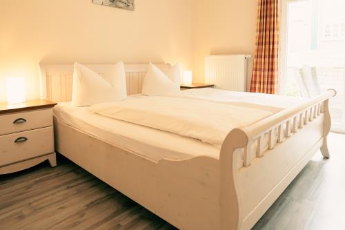 Spiekeroog Ferienwohnung Haus Seeschwalbe In d&#39; Dörp - 14 - Schlafzimmer 1