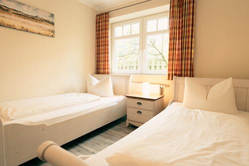 Spiekeroog Ferienwohnung Haus Seeschwalbe In d&#39; Dörp - 14 - Schlafzimmer 2