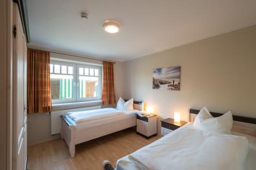Spiekeroog Ferienwohnung Haus Seeschwalbe Up de Dün - Schw. Nest - Ausstattung 1
