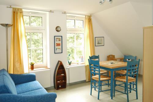 Spiekeroog Ferienwohnung Haus Sonnenstern - Steuerbord - Heller Wohnbereich