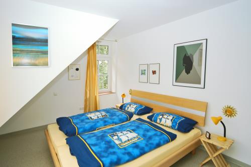 Spiekeroog Ferienwohnung Haus Sonnenstern - Steuerbord - Gemütliches Schlafzimmer