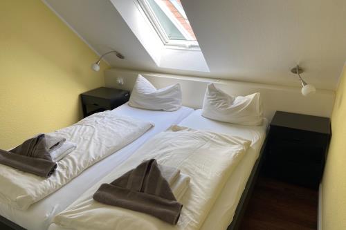 Spiekeroog Ferienwohnung Haus Süderhörn - 4 - Wohnung 4 - Schlafzimmer