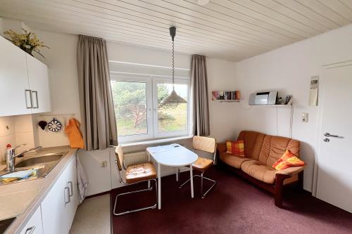 Spiekeroog Ferienwohnung Haus Windrose - NORD - NORD. Wohnzimmer