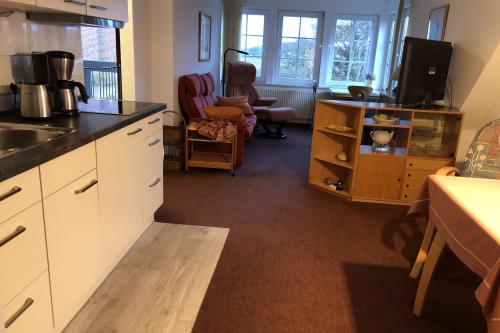 Spiekeroog Ferienwohnung Haus Windrose - OST - OST   Wohnzimmer-Küche-Veranda