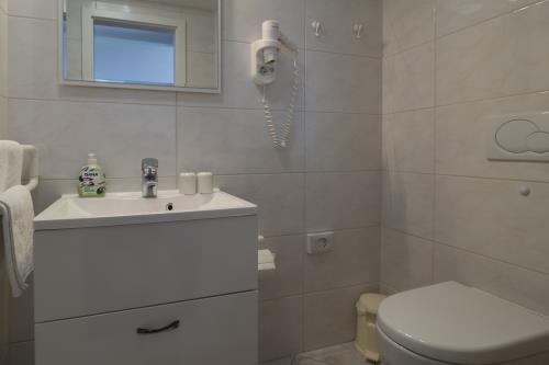 Spiekeroog Ferienwohnung Haus Windrose - OST - OST   Bad/WC