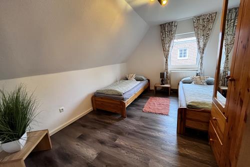 Spiekeroog Ferienwohnung Haus Wolf - Vorderdeck - Kinderzimmer