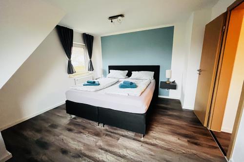 Spiekeroog Ferienwohnung Haus Wolf - Vorderdeck - Schlafzimmer