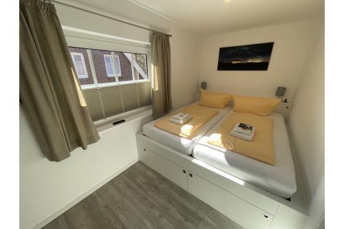 Spiekeroog Ferienwohnung Hotel Zur alten Inselkirche  &quot;FeWo´s&quot; - Blaumeise - FeWo Blaumeise