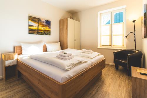 Spiekeroog Ferienwohnung Hotel Zur alten Inselkirche  "FeWo´s" - Buchfink - Ausstattung 1