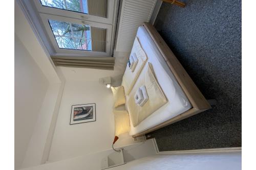 Spiekeroog Ferienwohnung Hotel Zur alten Inselkirche  &quot;FeWo´s&quot; - Rotkehlchen - FeWo Rotkehlchen