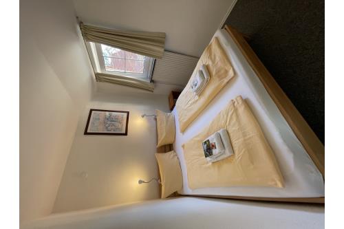 Spiekeroog Ferienwohnung Hotel Zur alten Inselkirche  &quot;FeWo´s&quot; - Zaunkönig - FeWo Zaunkönig