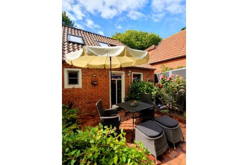 Spiekeroog Ferienwohnung Huus Wellhorn mit Atelier Mondstein - Terrasse Huus Wellhorn Ferienwohnung