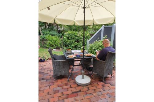 Spiekeroog Ferienwohnung Huus Wellhorn mit Atelier Mondstein - Sonne und Frühstück