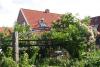 Spiekeroog Ferienwohnung Lütt Paradies - Haus vom Garten gesehen