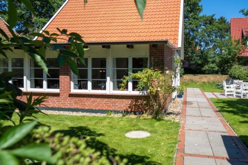 Spiekeroog Ferienhaus Pastors Tuun - Außenansicht Süd