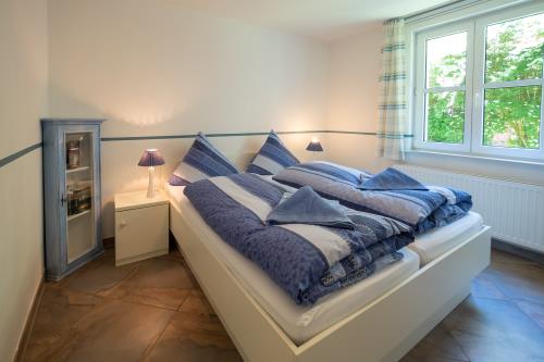 Spiekeroog Ferienhaus Pastors Tuun - Schlafzimmer EG