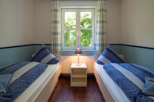 Spiekeroog Ferienhaus Pastors Tuun - 2-Bett-Zimmer EG