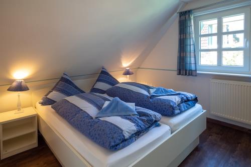 Spiekeroog Ferienhaus Pastors Tuun - Schlafzimmer OG