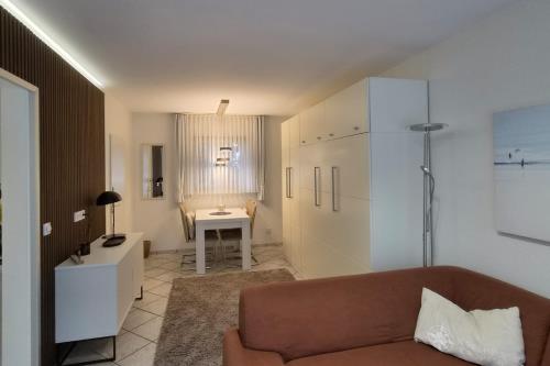 Spiekeroog Ferienwohnung Picks Logierhaus, Neubau App. N3 - Wohnbereich mit Schrankbett