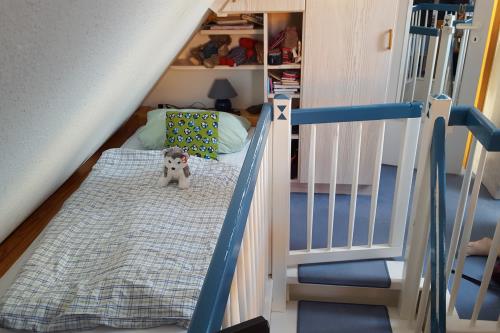Spiekeroog Ferienwohnung Wes blied - Sei glücklich - Schlafzimmer Spitzboden 3. Bett