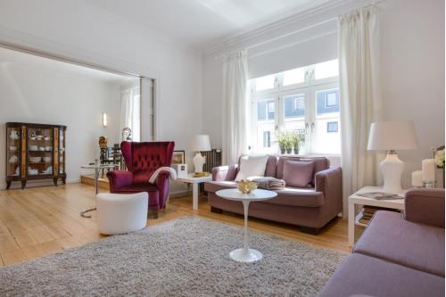 Sylt Ferienwohnung Die Schlosserei - Luxus in der Friedrichstraße - Wohnzimmer